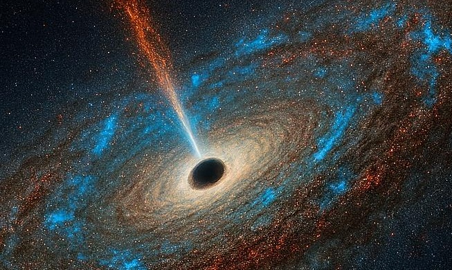 Institute helps find supermassive galaxy glowing bright blue